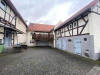 Hauptbild 2 Wohnhäuser (Neubau und Fachwerkhaus) in Heuchelheim-OT mit großem Grundstück